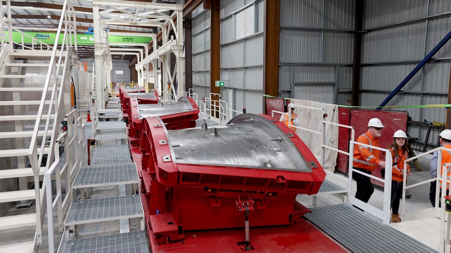 A row of red tunnel segments at the Sydney Metro Eastern Creek facility.