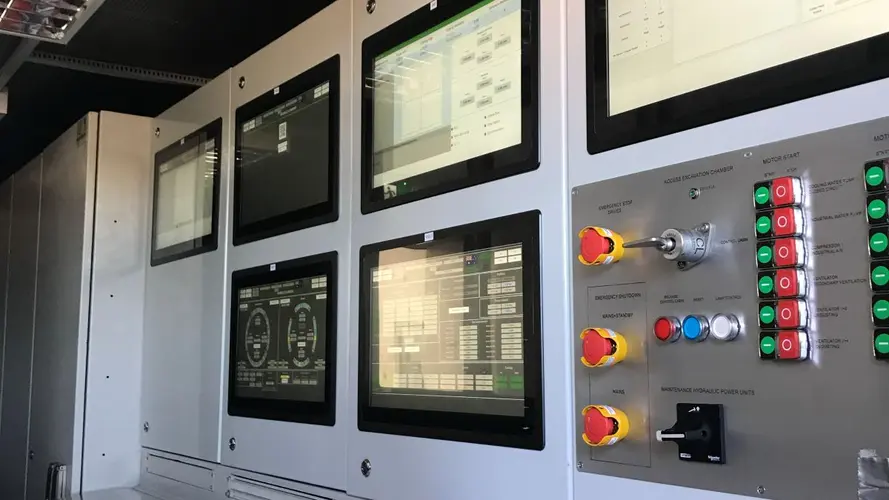 TBM cabin with different coloured buttons at the Tunnelling and Infrastructure Academy