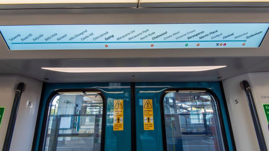 Station names on the screen of a metro train