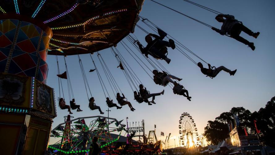people are enjoying a big swing at the Easter show