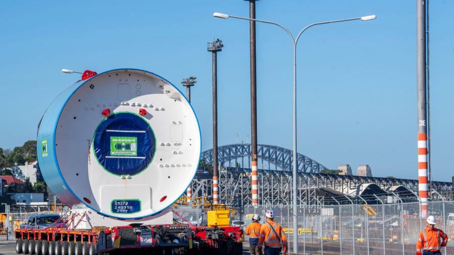 TBM front shield being brought in on wheels in front of the Harbour Bridge