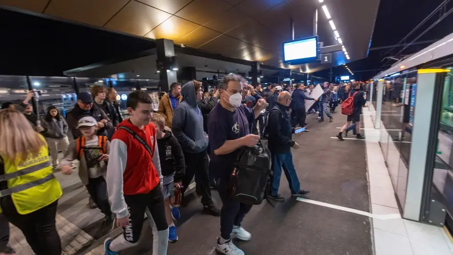 people getting on the the metro at Sydenham Station