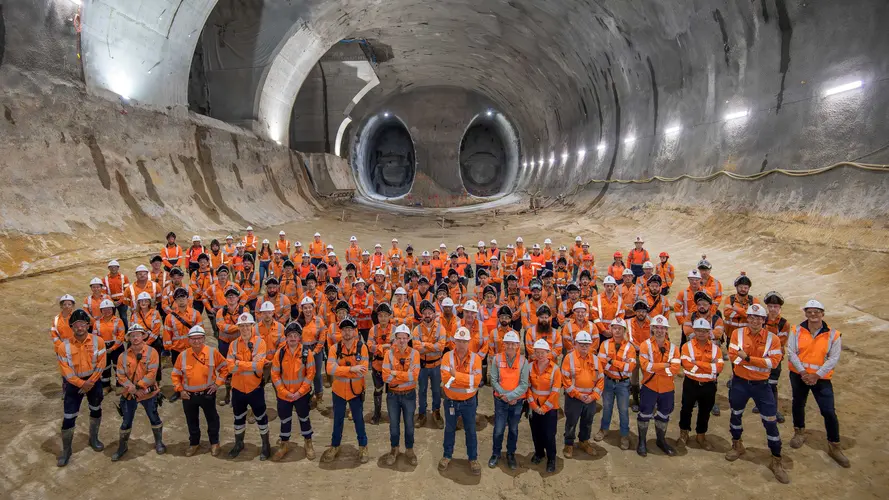 Construction workers standing in Hunter Street cavern