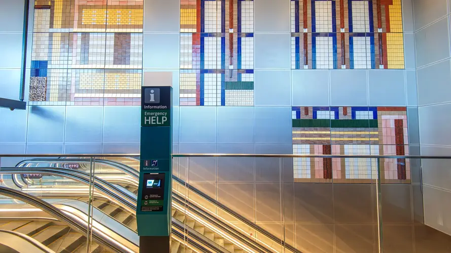 Crows Nest Station art wall and escalators