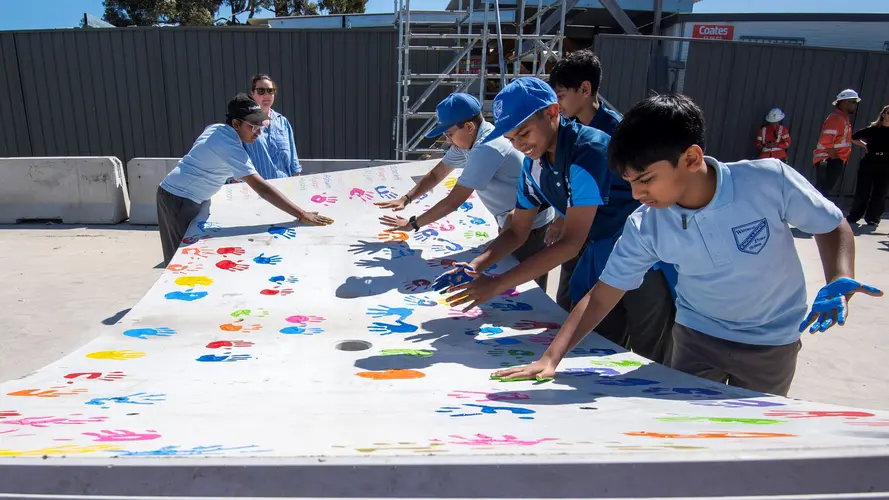 Westmead Primary School students printing hands