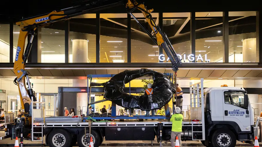 Metro art being installed at Gadigal Station