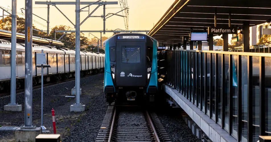 Train destined for Bankstown sitting at Sydney Metro station platform